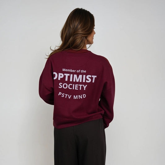 Member of the Optimist Society. Crewneck in Rich Wine Red