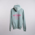 Member of the Optimist Society. Boxy Hoodie in Soft Sage.