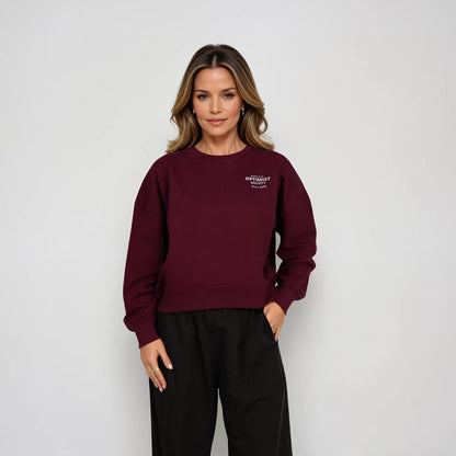 Member of the Optimist Society. Crewneck in Rich Wine Red