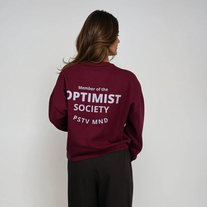 Member of the Optimist Society. Crewneck in Rich Wine Red