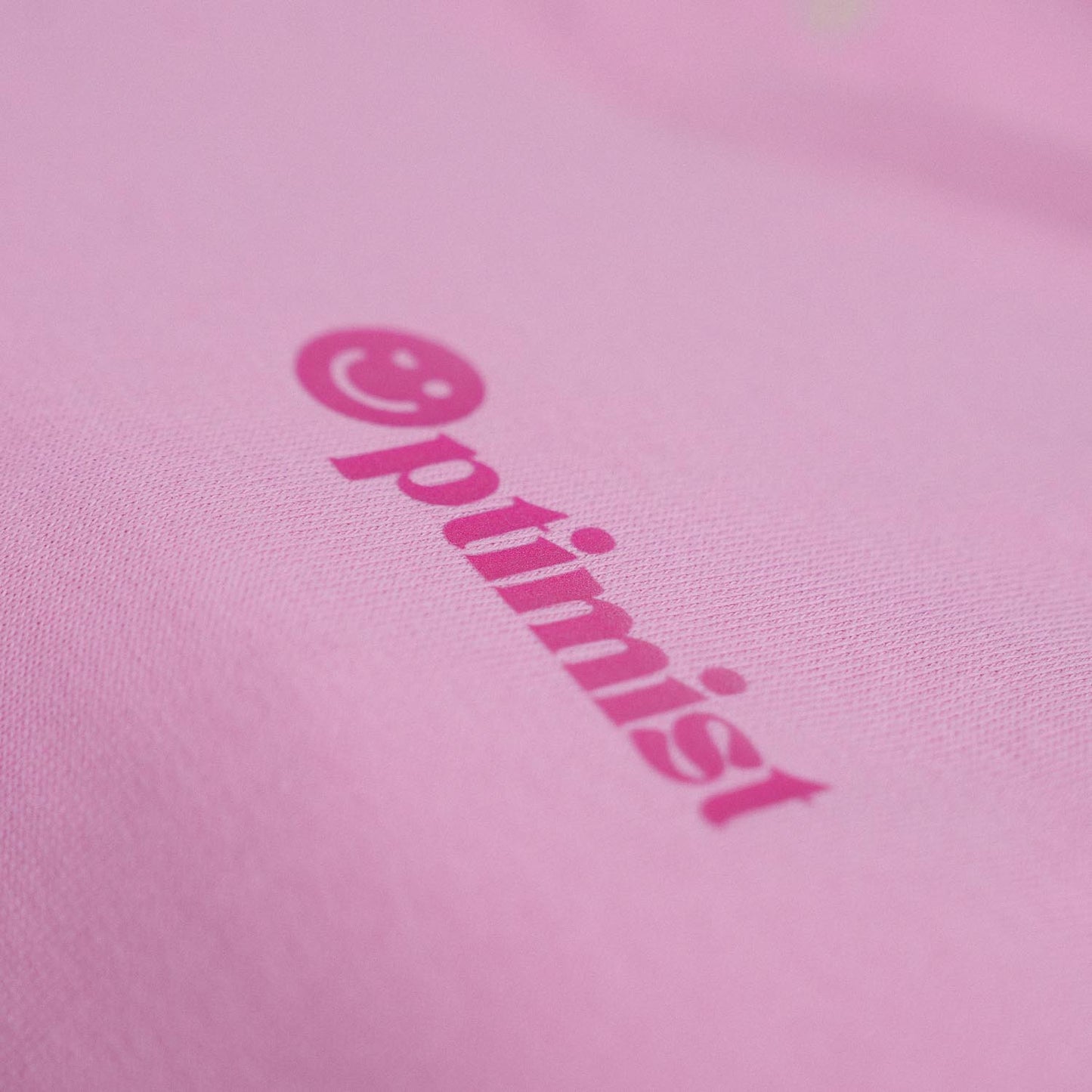 Optimist. Crewneck in Playful Bubblegum.